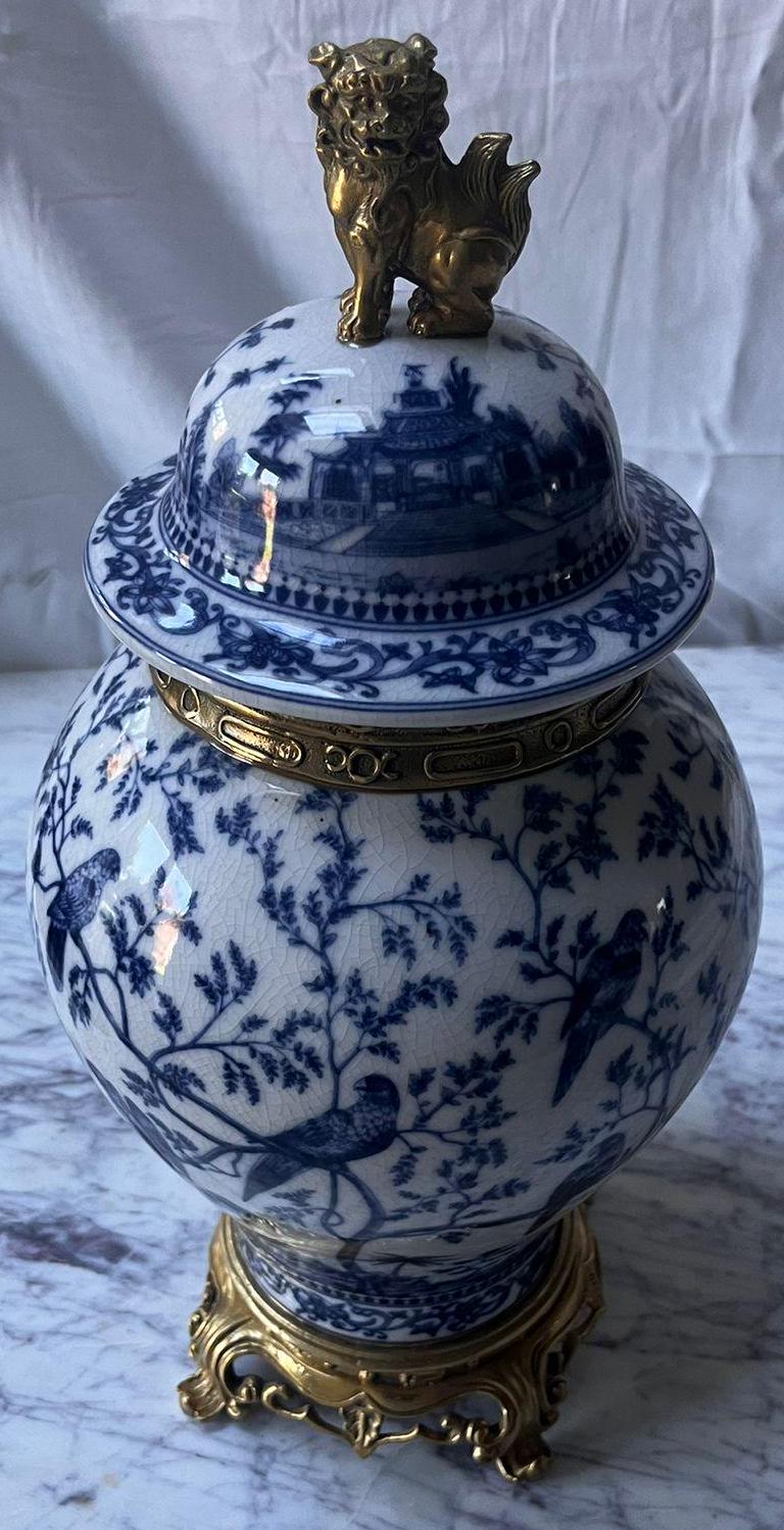 Blue and White Ginger Jar: Bronze Foo Dog Lid, Parrot Motif