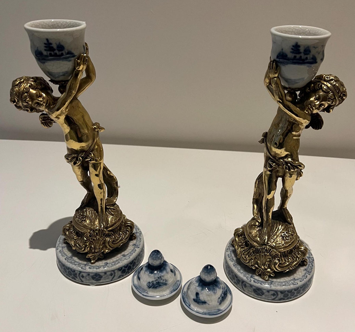 Pair of Cherub Candle Holders with Blue & White Porcelain Urns – Ornate Gilt Candelabras