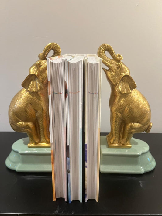 Vintage‑Style Gold Elephant Figurines – Decorative Pair on Green Pedestals